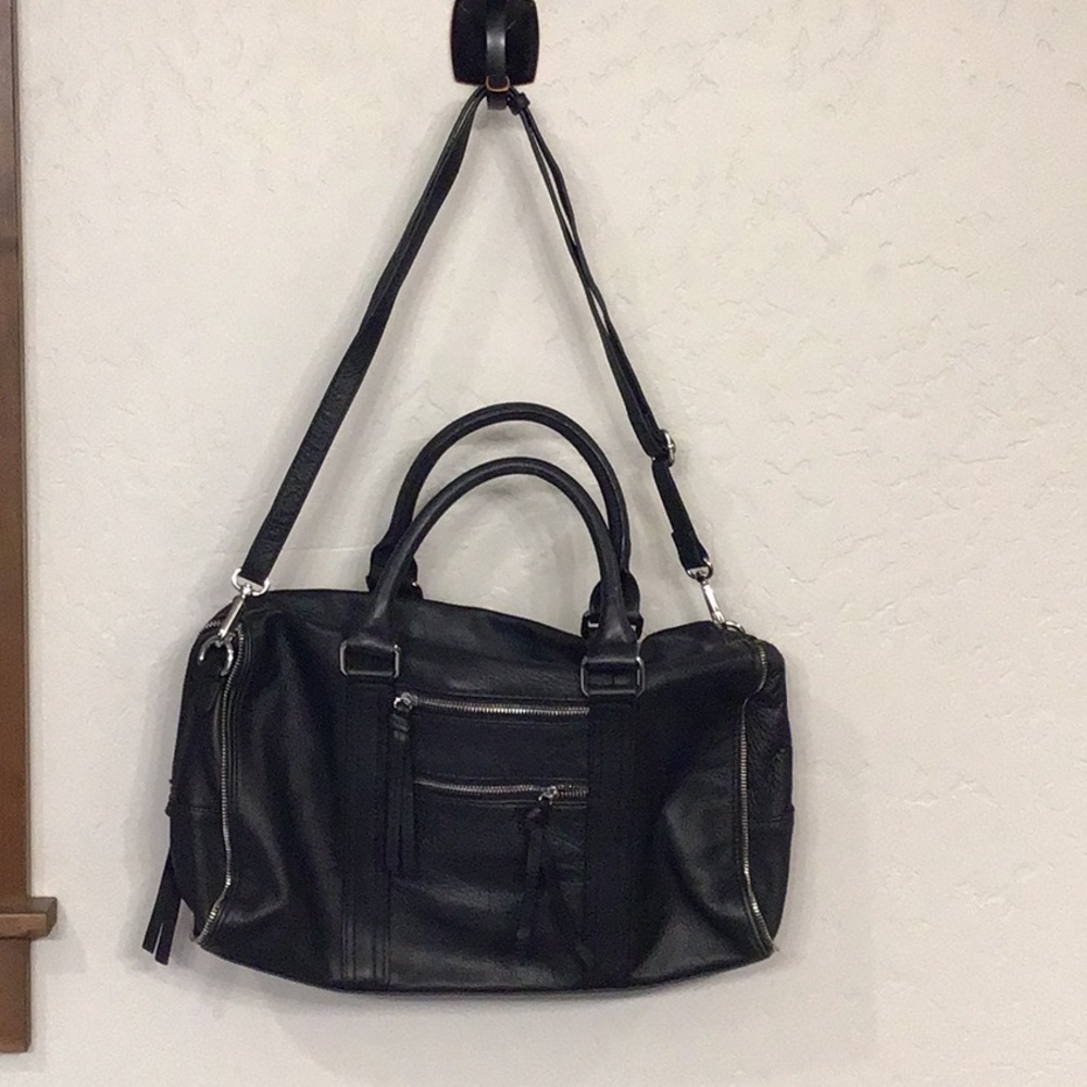 C.Z. Falconer black leather convertible crossbody tote.